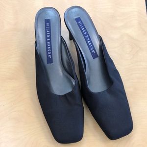 Black slider shoe slightly worn w/ 2” heel.